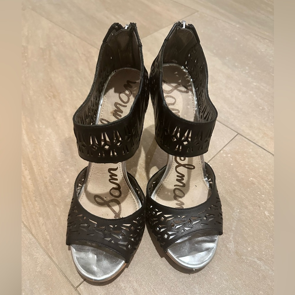 Sam Edelman heels. Black leather across ankle and toes. Silver bottoms